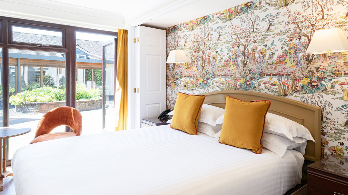 Room-112-Classic-King-Dog-Friendly-Old-Reception-View-Bed-&-Doors