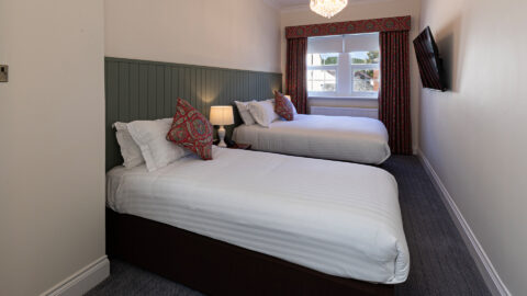 Room-21-Family-3-Room-Window-Building-View