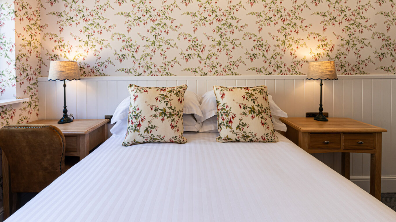 Room-26-Bed-Cosy-Double-Building-View