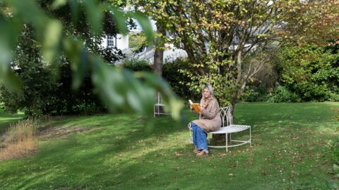Hayley, reading in the gardens, lake district castle inn hotel, bassenthwaite