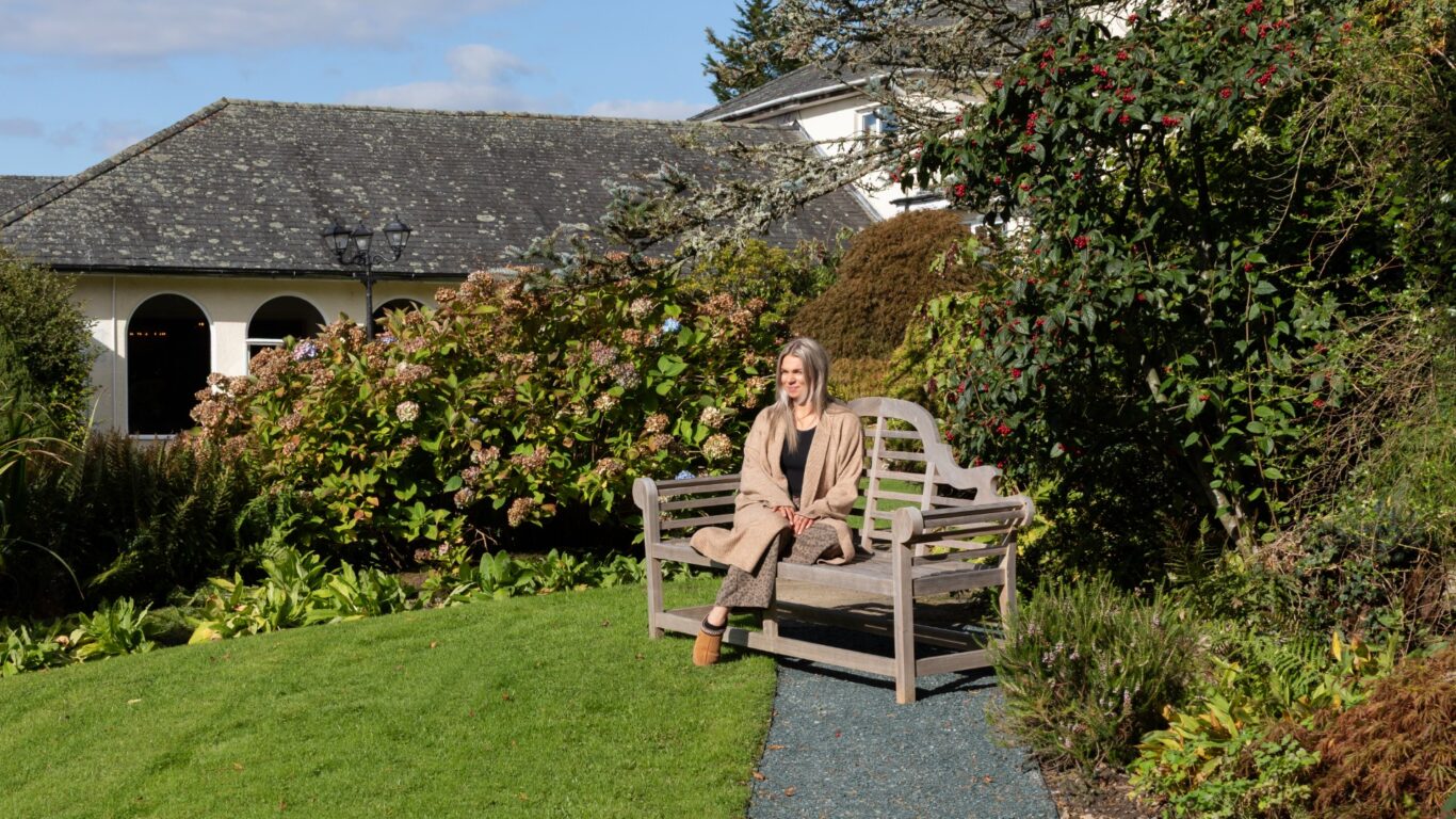 sat in the gardens, lake district castle inn hotel, bassenthwaite